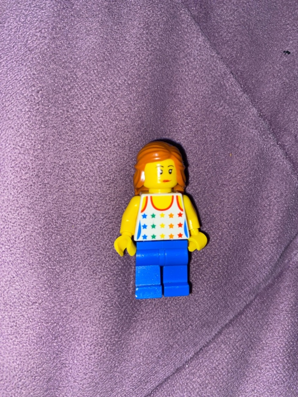 Lego Yellow Minifigure with White Rainbow-Star Tank and Blue Legs
